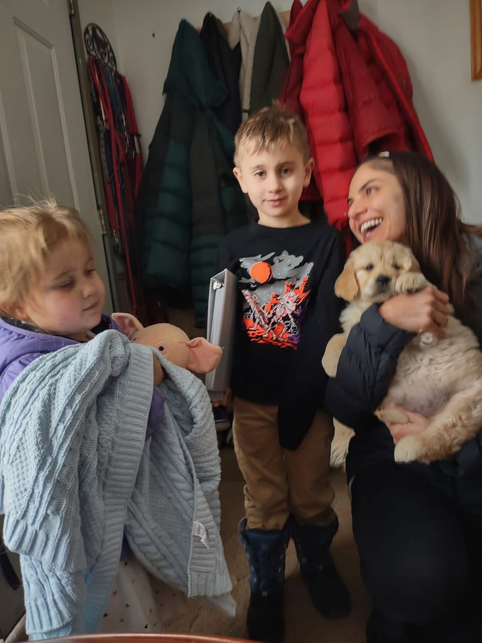 Golden retriever hiking with family